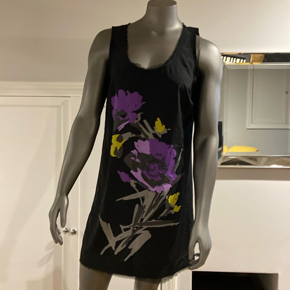 Coverup? Sleepwear? Tunic? Dress? Any of the above! 100% polyester